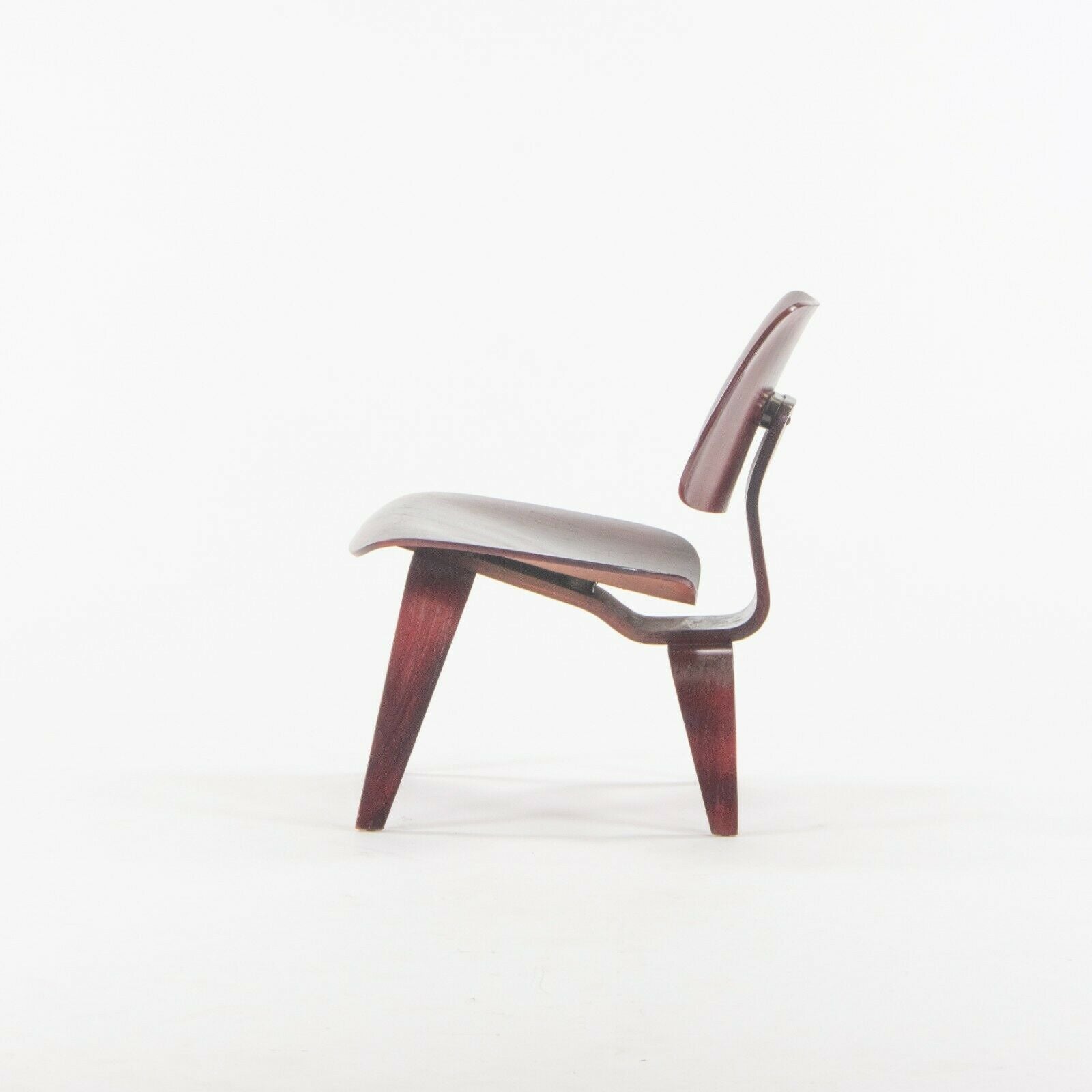 SOLD 1954 Herman Miller Eames LCW Lounge Chair Wood Refinished Red Aniline with Label