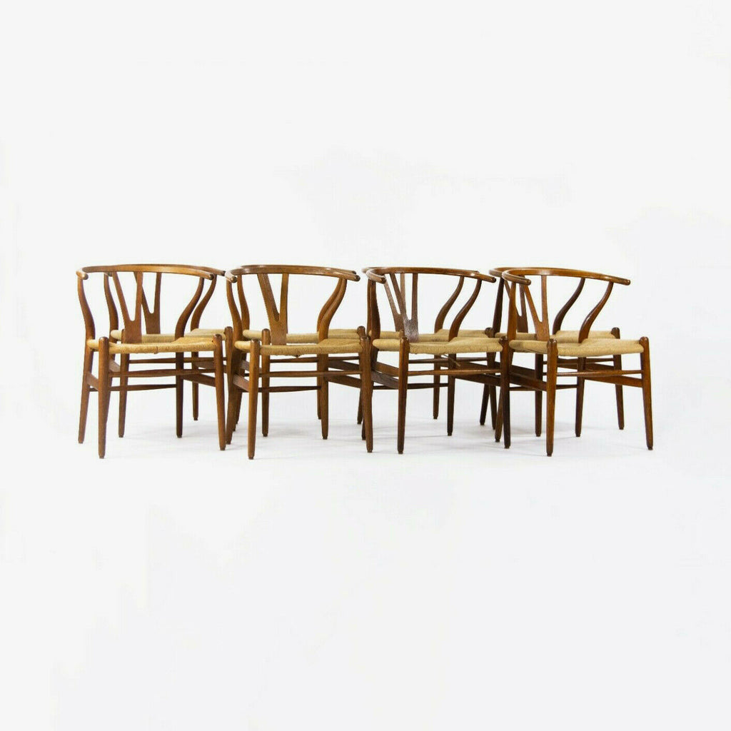 SOLD 1960s Set of Eight Hans Wegner Wishbone Chairs for Carl Hansen of Denmark in Oak