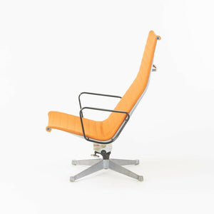 SOLD 1960s Herman Miller Eames Aluminum Group Lounge Chair and Ottoman w/ Orange Fabric