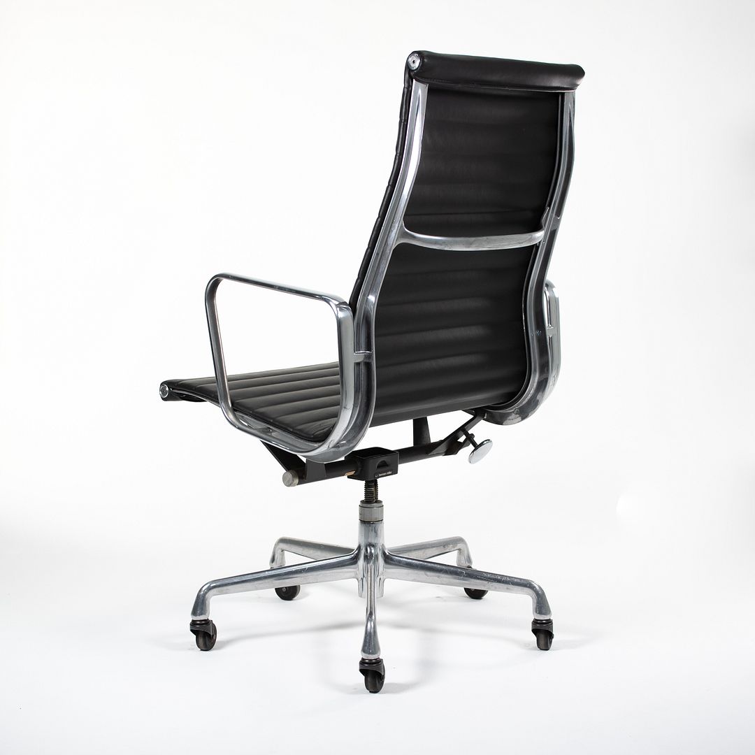 SOLD 2010s Aluminum Group Executive Chair by Charles and Ray Eames for Herman Miller in Black Leather