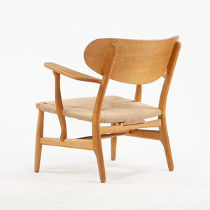 SOLD 1950s Hans Wegner CH-22 Oak Lounge Chairs Denmark Carl Hansen & Son 2x available