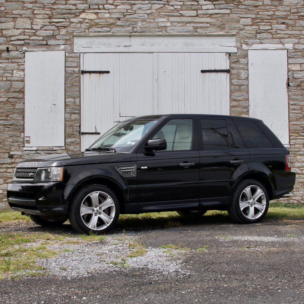 SOLD 2011 Range Rover Sport 5.0L Supercharged in Black with Ivory Interior