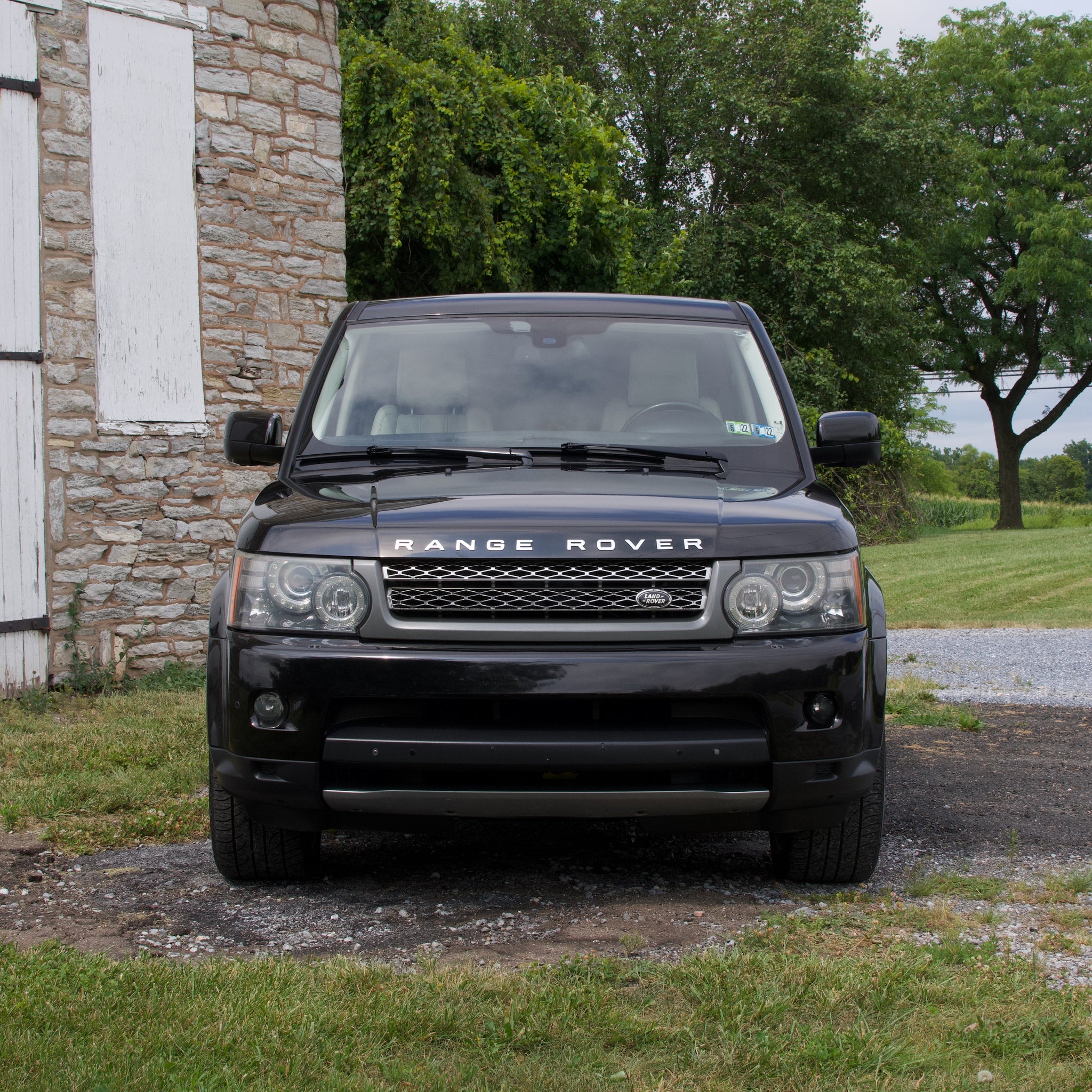 SOLD 2011 Range Rover Sport 5.0L Supercharged in Black with Ivory Interior