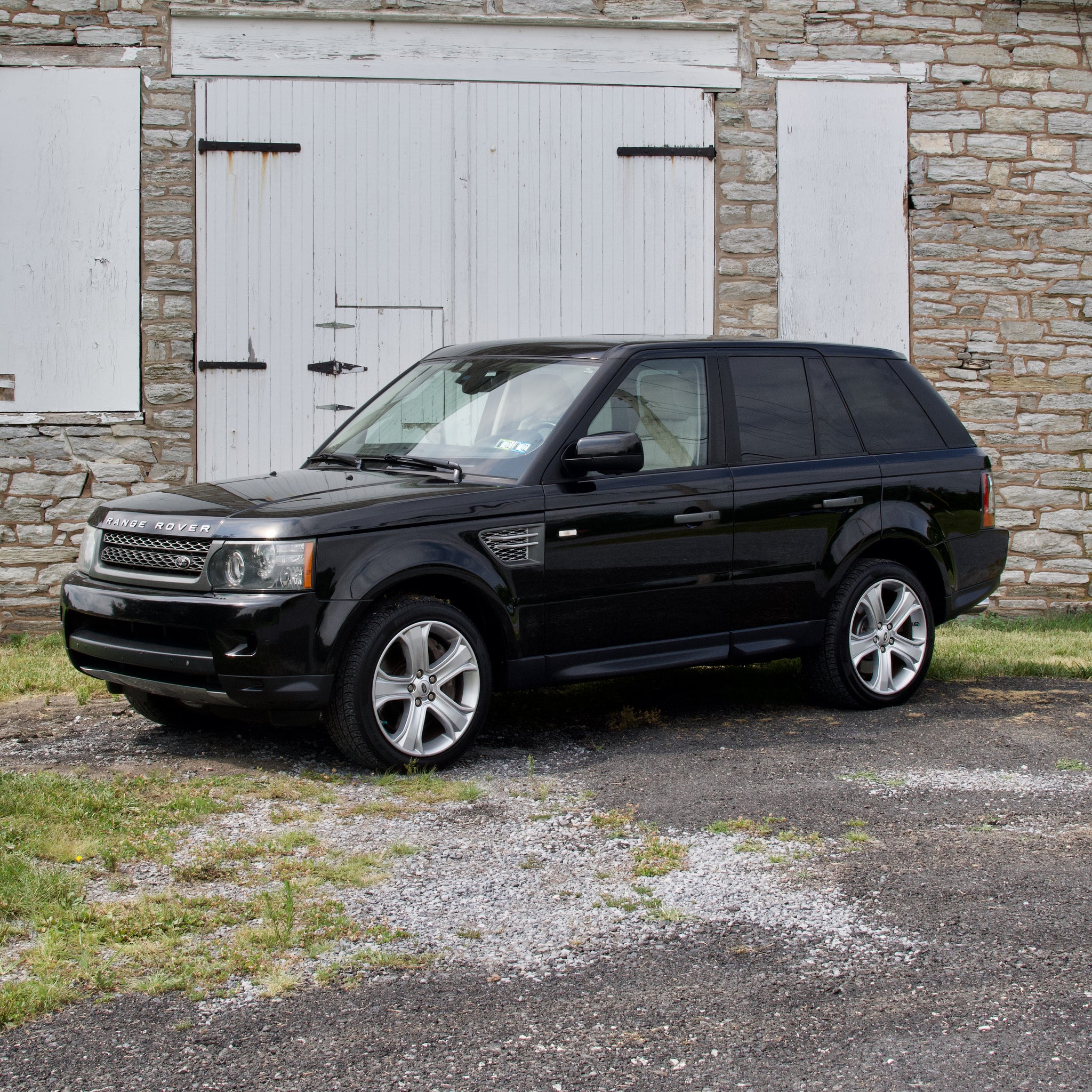 SOLD 2011 Range Rover Sport 5.0L Supercharged in Black with Ivory Interior