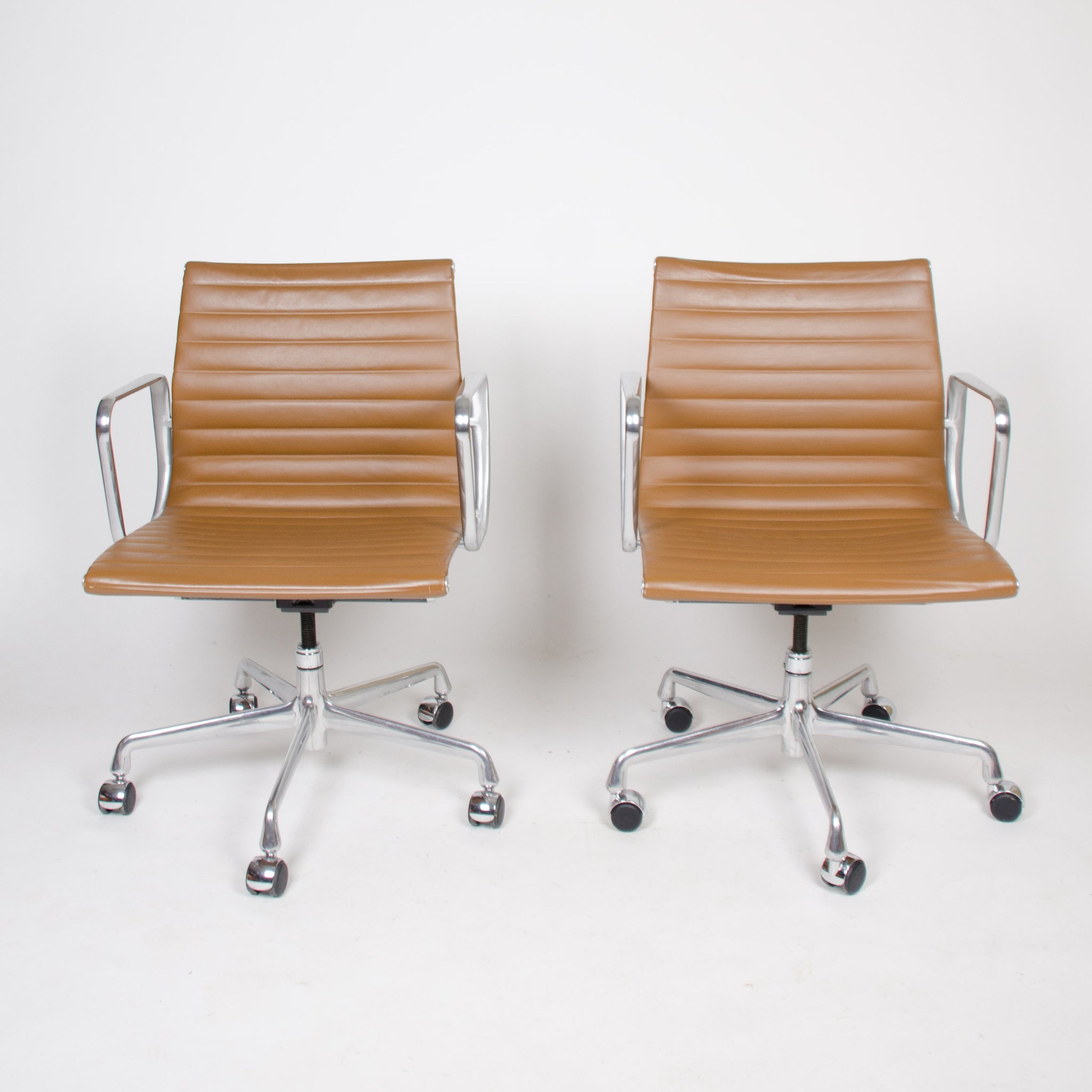 SOLD Eames Herman Miller 2000's Caramel Low Aluminum Group Desk Chairs