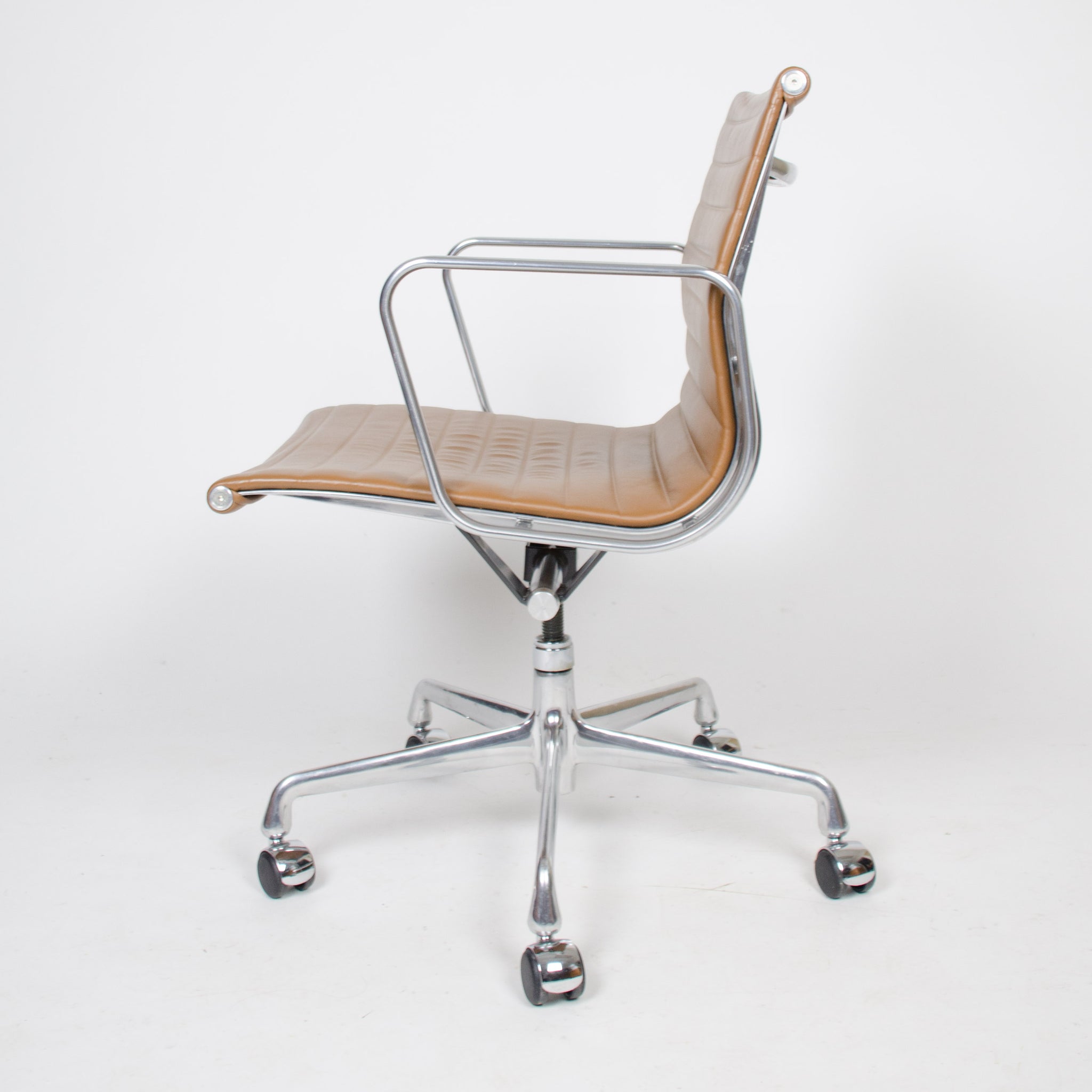 SOLD Eames Herman Miller 2000's Caramel Low Aluminum Group Desk Chairs