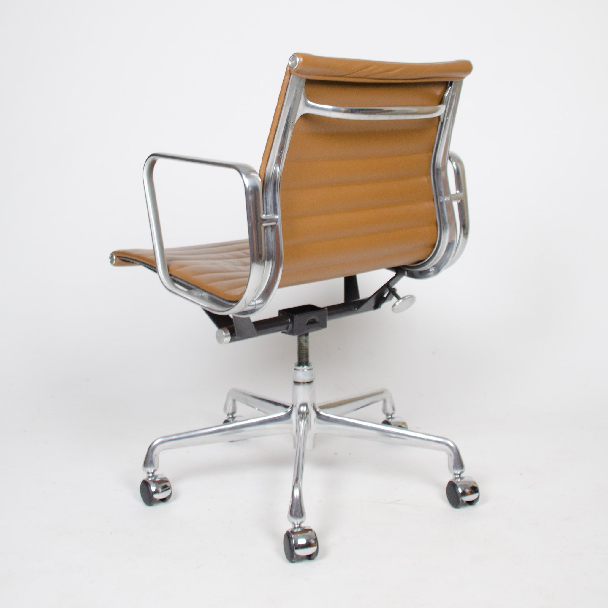 SOLD Eames Herman Miller 2000's Caramel Low Aluminum Group Desk Chairs