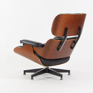 SOLD 1990s Herman Miller Eames Lounge Chair and Ottoman Cherry Black Leather 670 671