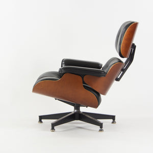 SOLD 1990s Herman Miller Eames Lounge Chair and Ottoman Cherry Black Leather 670 671