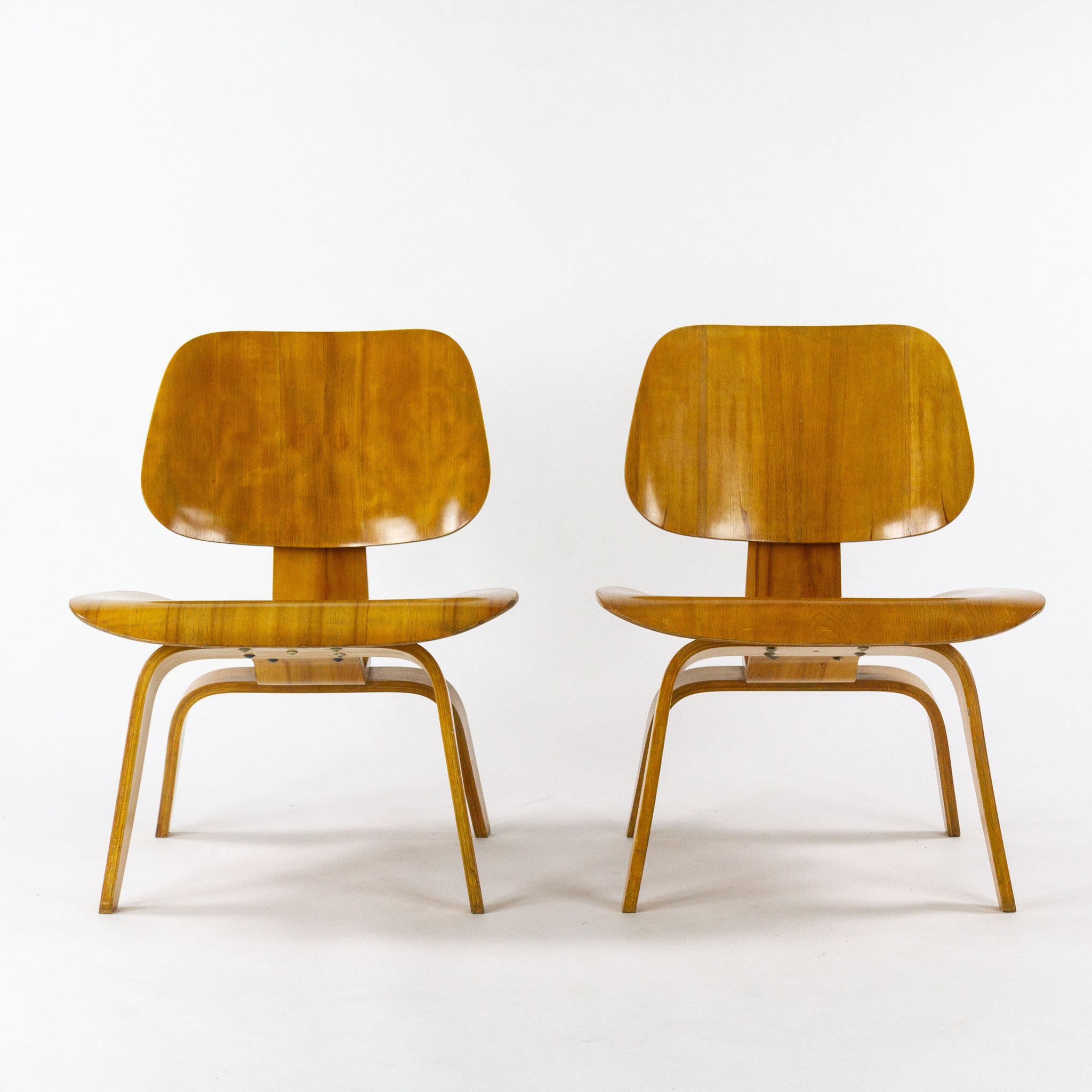 SOLD 1950 Pair of Eames Evans Herman Miller LCW Lounge Chair Wood in Calico Ash Wood