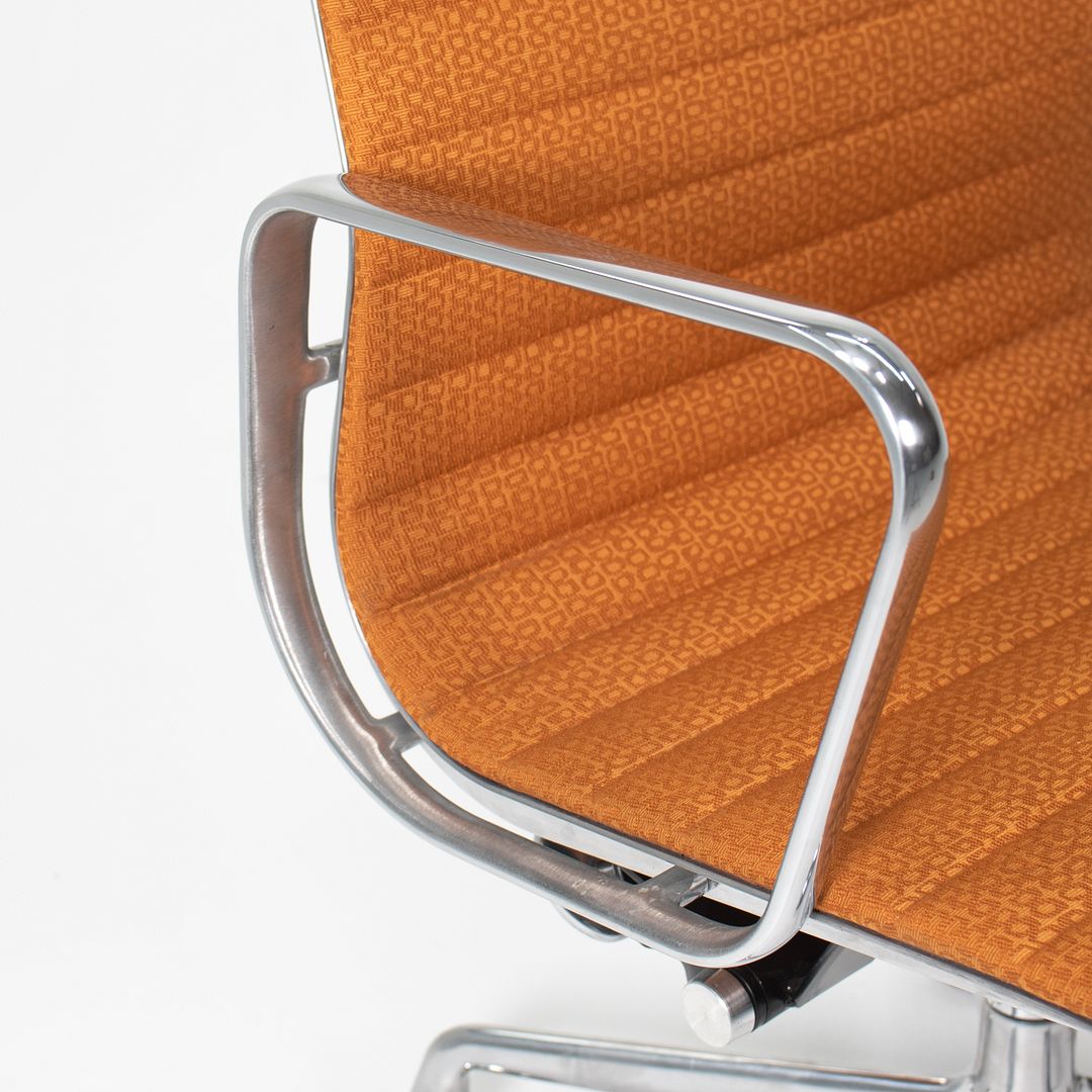 SOLD 2015 Eames Aluminum Group Management Chair by Charles and Ray Eames for Herman Miller in Orange Coil Fabric