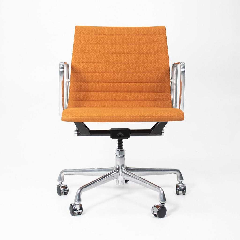 2015 Eames Aluminum Group Management Chair by Charles and Ray Eames for Herman Miller in Orange Coil Fabric
